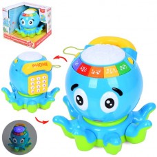 Игра 35651 осьминог, 16см, музыка, звук(англ,испанск), буквы, цифры, звуки животных, свет, барабан, ездит, на бат-ке, в кор-ке