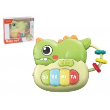 Музыкальное пианино динозавр свет звук Baby Toys, 15 см, светящийся и звучащий 5805