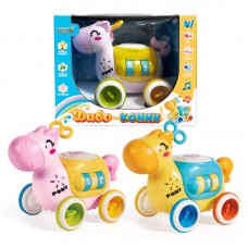 Музична іграшка 56772 "WToys", 2 види, “Диво-коник”, ОЗВУЧУВАННЯ УКРАЇНСЬКОЮ МОВОЮ, 8 пісень, мелодії, підсвічування, пальчикові ігри, гумові елементи, заводний ключик - тріскачка, на коліщатках, в коробці