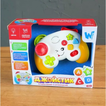 Розвивальний джойстик WToys 63566 з музикою та світлом Розвивальний джойстик WToys 63566 з музикою та світлом