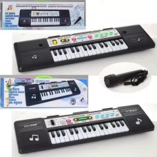 Детский синтезатор BabyToys MQ3108-3118 31 клавиша с микрофоном