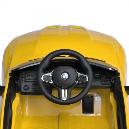 Детский электромобиль BMW M4 Competition Cabrio Bambi M 5096 EBLR-6, 2 мотора по 35W, EVA, экокожа, MP3, Bluetooth, желтый Детский электромобиль BMW M4 Competition Cabrio Bambi M 5096 EBLR-6, 2 мотора по 35W, EVA, экокожа, MP3, Bluetooth, желтый