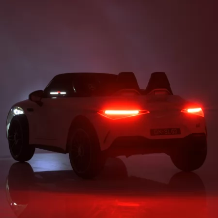 Детский электромобиль Mercedes-AMG SL 63 Roadster Bambi M 5098EBLR-1 двухместный, 4 мотора по 35W, EVA, кожа, MP3, USB, Bluetooth, белый